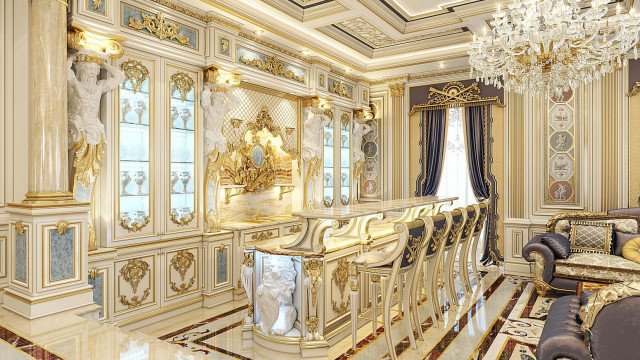 Elegant and ornate marble staircase with gilded balustrade and gold-leafed ceiling.