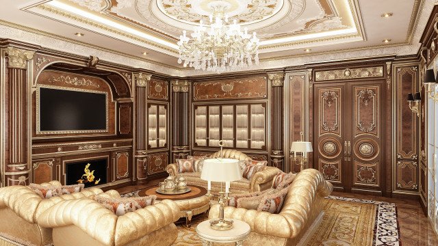This picture shows an opulent interior design. The room features an ornate crystal chandelier and a luxurious velvet sofa with gold accents. Gold-framed art hangs on the walls, and lush, patterned rugs cover the floors. The overall look is grand and sophisticated.