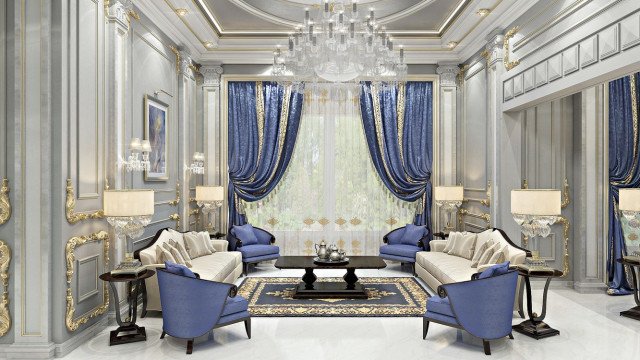 This picture shows an elegant interior decoration project that features a marble archway, accented with white columns and a black granite floor. There is a luxurious chandelier above the archway, which adds a touch of elegance to the space. A grand stairway in black and gold leads out of the room. Along with these features, there are dark wood furniture pieces and a modern fireplace in the background.