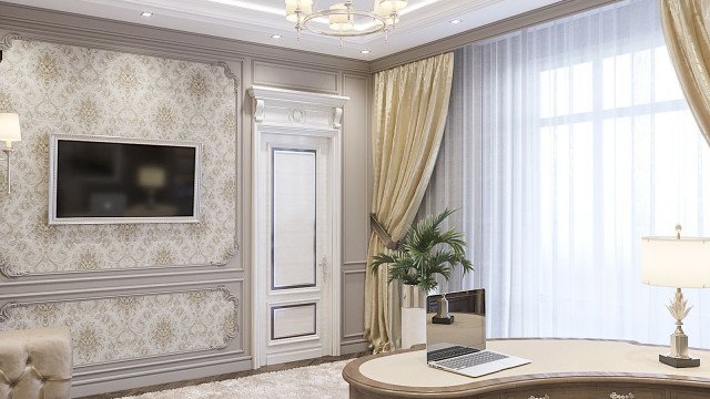 This image shows a luxurious living room in an opulent home. The room features a large corner sofa in a deep blue velvet upholstery, two matching armchairs, and a low coffee table with a glass top. To the left is a unique yellow armchair facing a classic fireplace mantel decorated with gold molding. Above the fireplace hangs a decorative mirror with an ornate frame. The light-colored walls are adorned with artwork and sconces, adding a polished and sophisticated look to the space.