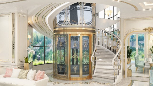 An ornate and opulent foyer with a curved grand staircase, marble floors and white walls, detailed woodwork and furnishings, and a crystal chandelier.