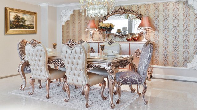 Drawing room with three white sofas, a black grand piano, and several lamps with white shades.