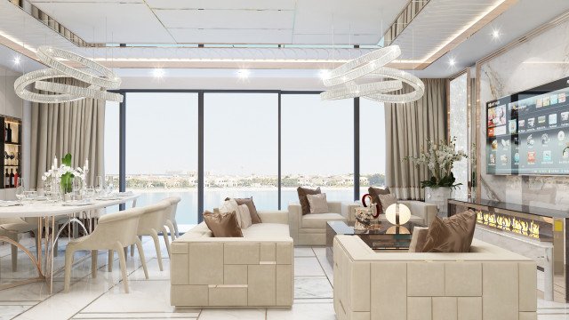 This picture shows a modern living room designed by Antonovich Design. The room features a beige and white color palette, with white walls and beige seating, and is accented with modern furniture and accessories. The room also has a large floor-to-ceiling window, which allows natural light to flood the space. A crystal chandelier hangs from the ceiling, while artwork, sculptures, and plants decorate the room. The space has a contemporary feel and appears warm and inviting.