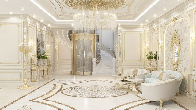 This picture shows a luxurious living room with elaborate, golden decor. The room is decorated with a yellow, patterned wallpaper and ornate gold chandelier hanging from the ceiling. The furniture includes a white leather sofa, a glass and metal coffee table, two armchairs, and a velvet ottoman in the center of the room. On the walls are paintings, and the area is lit by wall lamps and sconces. Also, there is a round wooden table near the door with two comfortable chairs.