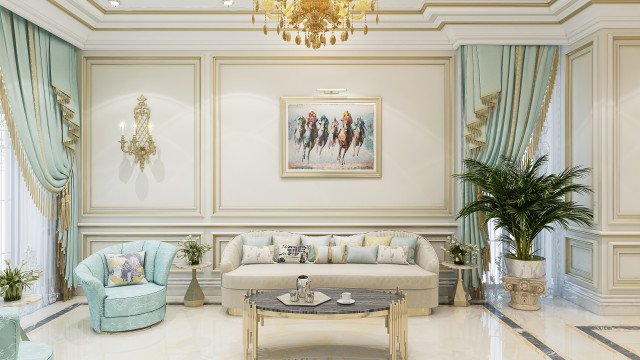This picture shows a grand and luxurious living room. The room has a large, white leather sectional sofa in the center. A gold ornate coffee table sits in front of the sofa with gold-colored trimmings along the edges. On either side of the table, there are two white armchairs with intricate patterns on the sides. On the left side of the room, there is a beautiful white marble fireplace. On the wall next to the fireplace are two wall-mounted sconces with intricate carvings. On the walls, there are elaborate pieces of wall art with a