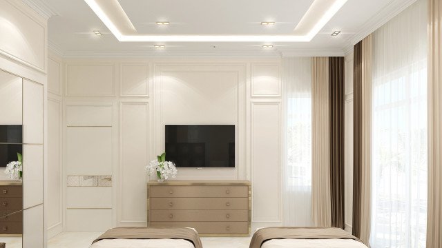 This picture shows an ornate living room interior design. The ornate walls are decorated in a classic style with patterned wallpaper, white and gold moulding, and gold accents throughout. The floor is covered in a luxurious cream coloured rug and the furniture is a combination of cream and beige leather couches and armchairs, a stone coffee table, and two matching side tables. Additionally, there is a large crystal chandelier hanging from the ceiling.