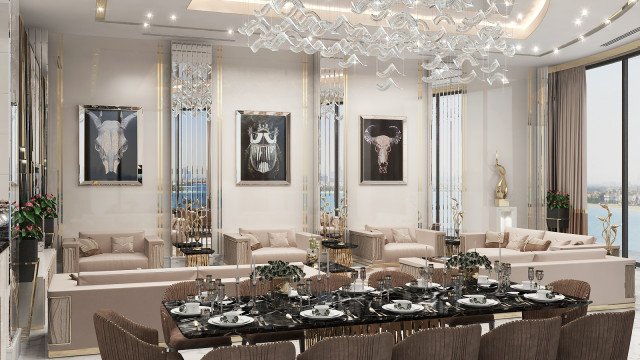 The picture shows a beautiful and luxurious dining room in modern style with beige wall, white ceiling, black marble floor, and exquisite crystal chandelier. The walls are adorned with golden ornaments, while the furniture includes a large wooden dining table with tall chairs upholstered in white leather. The room also features a built-in buffet cabinet with drawers and glass display cases.