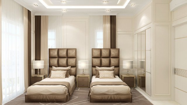 This picture shows a luxurious bedroom designed by Antonovich Design. The room features a large four-poster bed with a white and gold canopy, small nightstands on either side of the bed, a large window dressed with a white sheer curtain and patterned drapes, a luxurious white armchair, and a mirror hanging on the wall.