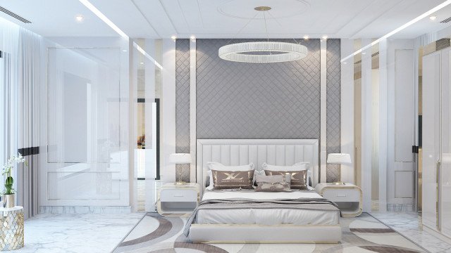 This picture shows an interior design project that has been completed by Antanovich Design. The room consists of a large, white sofa set in a corner, which has several small, white tables and chairs tucked away behind it. There are a couple of lamps on the wall, and a wide variety of pillows and throws tossed around the furniture. The walls are painted a deep blue, while the floor is made up of light grey marble tiles.