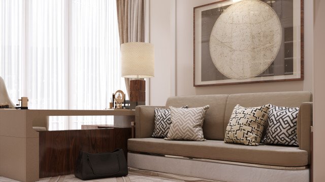 This picture shows a luxurious living room interior design with a large comfortable sofa in the center. The walls and floor are covered in light grey marble, and the furniture is upholstered in a brown velvet fabric. On either side of the central sofa sits a pair of cream armchairs with luxurious gold accents. The space is completed with a contemporary glass coffee table and a decorative artwork framed in gold and white.