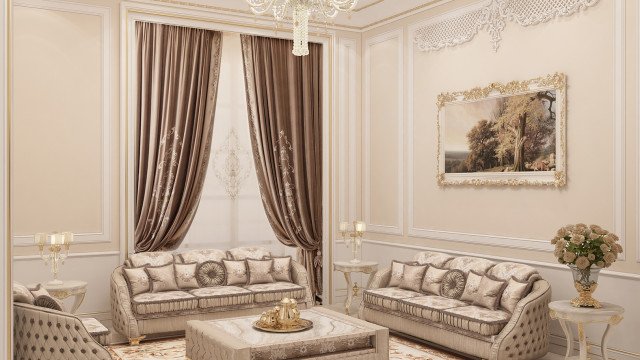 This picture shows a modern and luxurious interior design. The room has white walls with high ceilings and a large window with a beautiful view of the city. There is a luxurious sofa with a patterned rug underneath, and a classic wooden coffee table with a floral centerpiece in the middle. There is also an elegant, ornate chandelier hanging from the ceiling. Overall, it has a very modern, stylish, and elegant look.