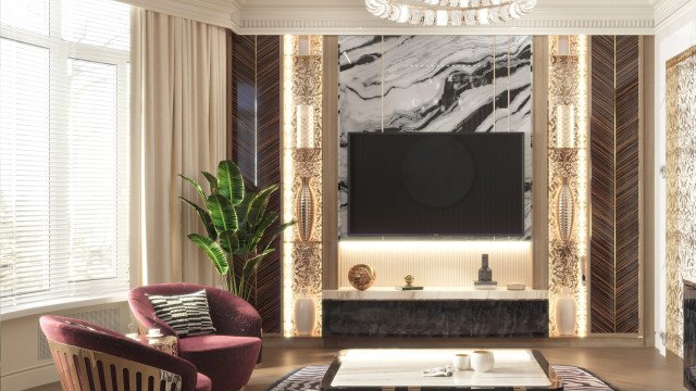 This picture shows a luxurious living room with an opulent decor. The room is outfitted with a grand maroon velvet sofa and loveseat, a white marble-topped coffee table, a crystal chandelier, and gold accents throughout. A large abstract painting hangs on the wall above the sofa. There are also two matching mirrors, cabinets, and shelving which add to the regal look of the room.