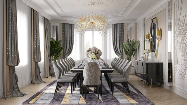 An awe-inspiring lounge with luxurious furnishing, custom ceiling detail, and beautiful marble interior design.
