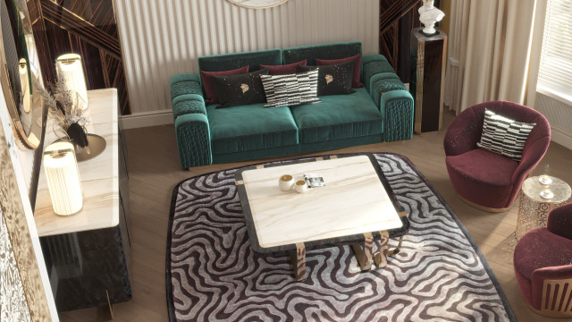 This picture shows a luxurious living room with a plush cream-coloured sofa set and a matching armchair set in the centre of the room. On both sides, there are gold-finished spherical side tables with lamps on top. There is a white shag rug in front of the sofa and armchair set, and the walls are finished in an elegant white and blue wallpaper. On either side of the sofa, there are two stunning wall arts and other decorative pieces. The floors are finished with light brown hardwood and glass French doors open out to a balcony.