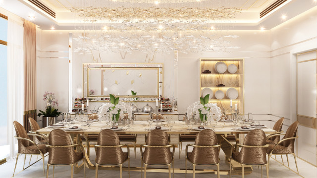 Modern luxury interior featuring cream and gold color palette with ornately embellished furniture, white marble floors, decorative metal accents, and crystal chandelier.
