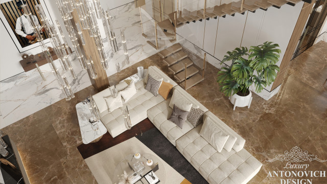 The picture shows an elegantly designed, modern white living room. It has contemporary furniture, walls and shelving in a variety of shades of white and grey. There is a fireplace on one wall, and a floor-to-ceiling window overlooking a beautiful outdoor view. The room also has two sofas, a coffee table, and some decorative accents like plants and artwork.