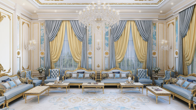 This picture shows a luxurious interior living room design. It features an ornate cream-colored wall with a matching marble fireplace, which is flanked by two white leather armchairs. In the center of the room is an opulent crystal chandelier suspended above a large brown and white rug. The walls are covered in intricate cream and gold wallpaper, while the floors are made of dark hardwood. On either side of the room are two large glass windows, complete with gold velvet curtains. Finally, there is a sofa and coffee table set in bright colors, as well as a side table with