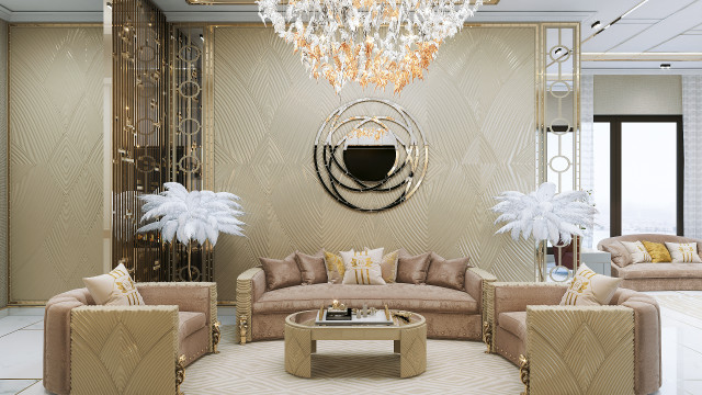 A contemporary residential interior featuring a grey and neutral colour palette, with a seating area comprising of a cream-coloured sofa and armchair, accentuated by gold fixtures and complemented by a statement mirror.