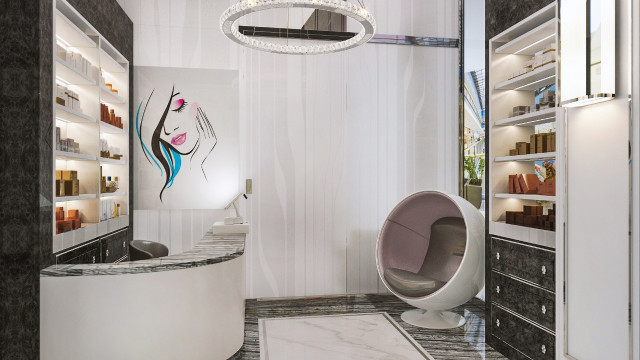 This picture shows a modern and luxurious bathroom design with a spa-like atmosphere. It features a large jacuzzi tub with a chrome waterfall faucet, surrounded by white marble tiles. Above the tub is a stunning chandelier and multiple pendant lights. There is also a floating vanity with two sinks and plenty of storage space. The walls are covered in a cream and white marble pattern, and a window with frosted glass provides plenty of natural light.