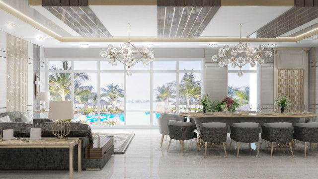 A grand entrance lobby with a black and white striped marble floor and a large crystal chandelier.