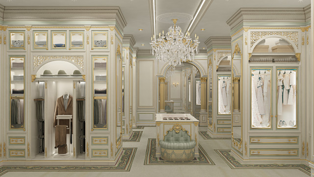 This is a picture of a luxurious bathroom designed by Antonovich Design. The bathroom features an intricately detailed marble floor and walls, a large free-standing soaking tub, and elegant gold fixtures. A vanity with double curved mirrors and marble countertops is featured in the corner of the room, and two wall sconces provide additional lighting. The overall look is one of sophistication and opulence.