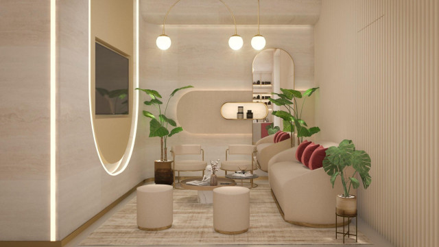 Modern living room featuring an off-white sofa set and accent walls, with a large custom chandelier as the centerpiece.