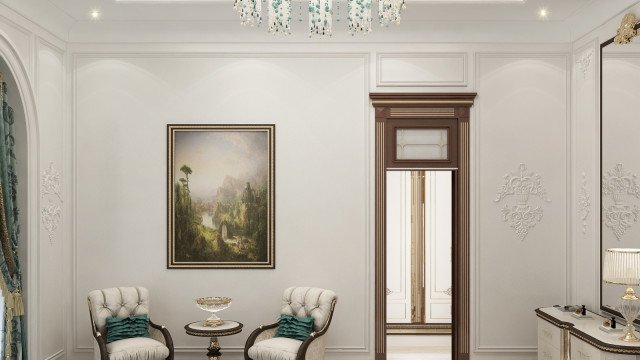 This picture is of an elegant and luxurious living room designed by Antonovich Design. The room features high ceilings, a white marble floor, a modern fireplace, and tall glass windows. It has cream-colored walls, light wood furniture, and artwork on the wall. The room is brightly lit from the light fixtures in the ceiling, as well as natural light from the windows. In the center of the room is a large round table with chairs around it, and on the other side of the room is a comfortable seating area.