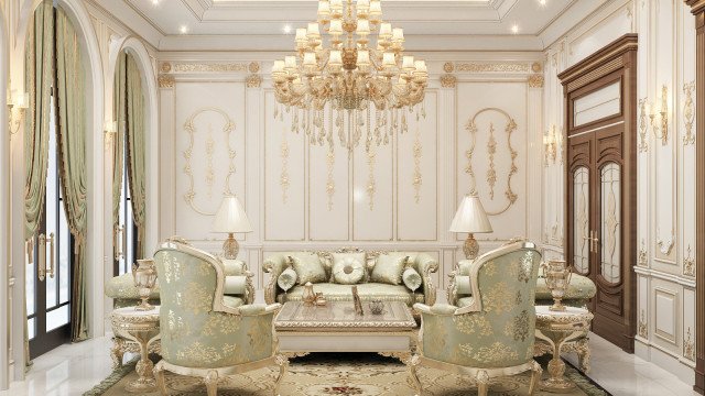 This picture shows a luxurious bedroom interior design. It has a large, intricately carved wooden bed with a light brown and cream quilted patterned comforter and accent pillows. The walls are decorated with an elegant damask wallpaper in muted colors. There is also a statement wall-mounted fireplace with sconces on either side. The room also features a luxurious chaise lounge with a white tufted leather upholstery and a glass-topped coffee table. A large crystal chandelier hangs from the center of the room, completing the classic yet sophisticated look.