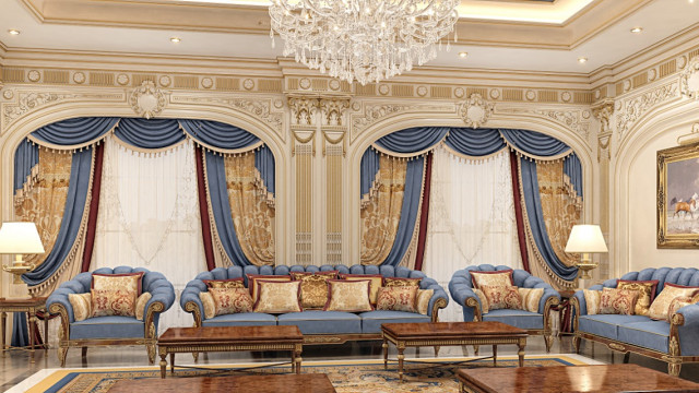jpgThis picture shows a luxurious interior design with a beautiful beige and gold color palette. The room features a large sofa with several comfortable pillows in a classic curved shape, as well as an elegant glass coffee table. There is a white marble fireplace with ornate carved wood trim, as well as a plush chair upholstered in a rich gold fabric. The walls are finished with intricately patterned wallpaper, and a crystal chandelier hangs from the ceiling. The space has a sense of warmth and sophistication, perfect for entertaining guests or relaxing after a long day.