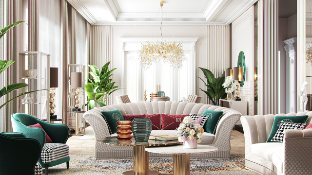 An elegant and sophisticated color-coordinated living room featuring a maroon velvet couch, matching ottoman and armchairs with accent pillows, white rug, and beige walls.