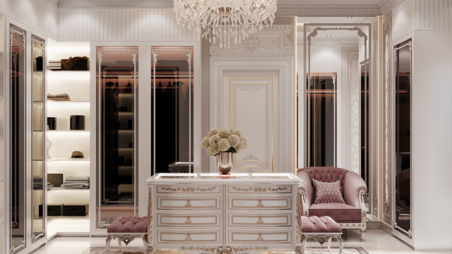 This picture shows an interior design by Antonovich Design, featuring a luxurious modern home with a grand marble staircase in the center of the room. The walls are painted in a dark grey color, and the floor is covered in white marble tiles. In the background, there is a large crystal chandelier hanging from the ceiling, contrasting with the sleek furniture pieces in the foreground.