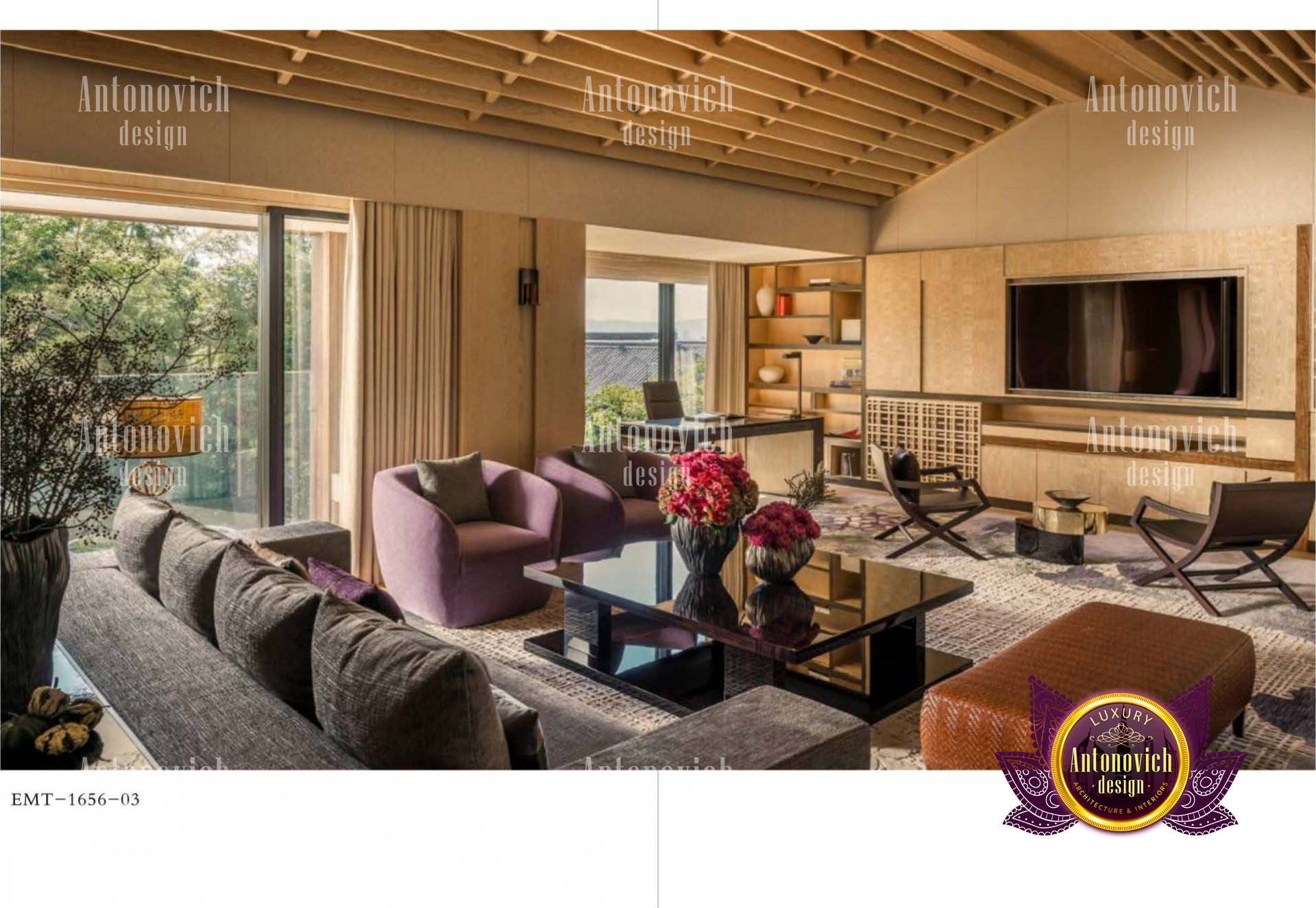 This is a picture of a luxurious living room with modern furniture. The room features a grey and white color palette with large leather sofas, a white coffee table with glass top, a round crystal chandelier, two golden armchairs, and contemporary artwork on the wall.