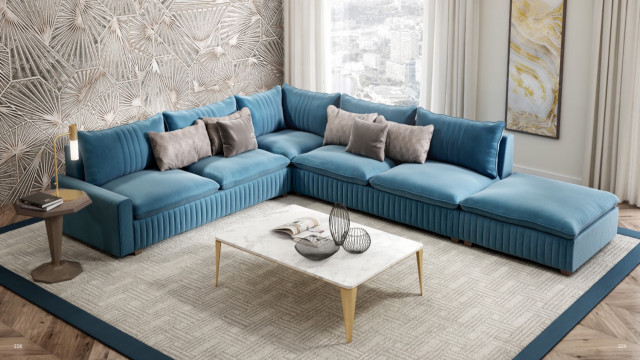 This picture shows an artistic rendition of a contemporary living room design. The room features several pieces of modern furniture, including a white sofa, a rectangular glass coffee table, and two grey armchairs. A white and grey patterned area rug grounds the room and provides texture, while a wall-mounted TV and artworks add decorative elements. The walls are painted in a light grey tone and dark brown accents complete the look.