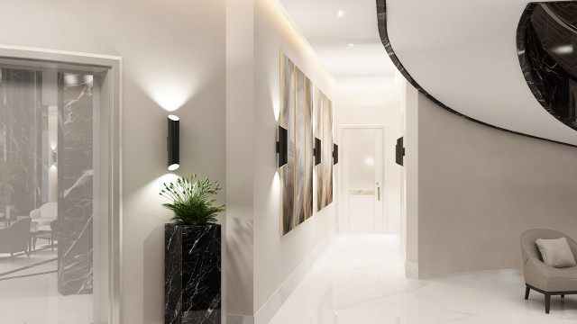 This picture shows an elegant, modern home interior. It features a luxurious, curved staircase with a glossy black railing and an intricately patterned marble floor. There is an abstract art piece on the wall, framed in gold and flanked by floating shelves. The ceiling is painted white and has a stylish ribbon chandelier hanging from it, giving the room a bright and airy ambiance. The hallway is lined with light wood paneling, which creates a warm and inviting atmosphere.