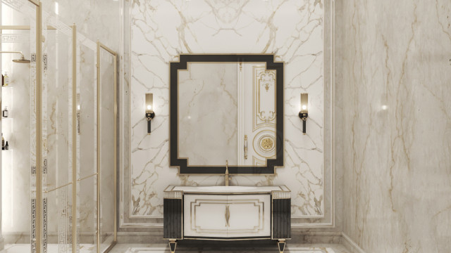 This picture shows a modern bathroom design with white marble tiling on the walls and floors. The room is well-lit by two large windows that let in plenty of natural light and feature a luxurious bathtub situated in front of them. There is a double sink vanity in the corner, with cabinets for storing items and a shower stall at the back of the room. Additionally, there are various decorative elements such as a lighted mirror framed by sconces, a wall-mounted towel rack, and a sleek, contemporary design for the taps.