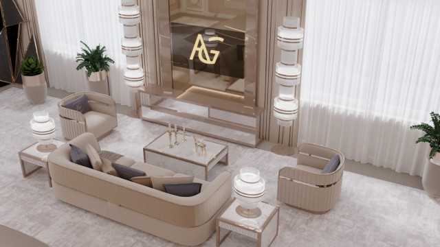 The picture shows a luxurious living room designed by Antonovich Design. The room features plush furniture, a large crystal chandelier, and ornate decorations. There is a curved staircase in the center of the picture with beautiful ornamental details on the riser and posts, as well as a marble floor. The walls are decorated with a classic wallpaper design and golden detailing. The room has a warm and inviting ambiance.