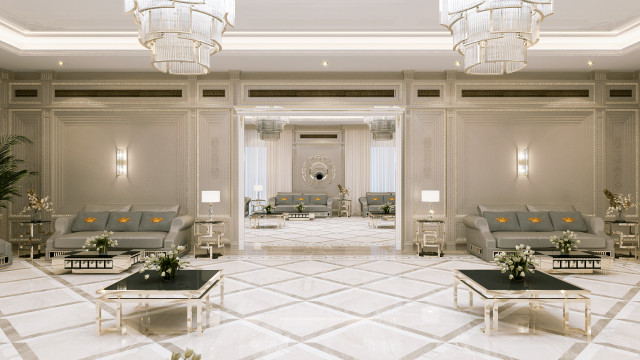 Modern room with marble floor, beige-colored walls, and upholstered furnishings.