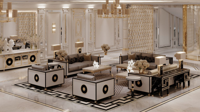 This picture shows an opulent and luxurious living room with golden accents and bright white furniture. The walls have an elegant beige and cream striped pattern, while the floor is a warm brown hardwood. The seating area consists of a white sofa and two matching armchairs with gold cushions and detailing. A sleek glass coffee table sits between them and off to the side there is a large, ornate fireplace with a large mirror above it. The room also includes a few tall potted plants for added greenery.