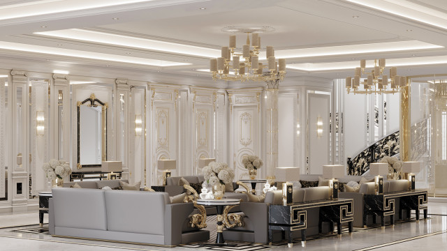 This picture shows a luxurious living room with modern decor. It has a glamorous palette of gold and white, with accents of black and silver. The furniture is upholstered with velvet in shades of champagne, cognac and white. A grand fireplace stands in the center of the room, flanked by two dramatic floor-to-ceiling windows with views of the outdoor landscape. The walls are adorned with intricate wallpaper and one wall features a stunning gold chandelier. The floor is covered in a light grey carpet which offsets the bold colors of the furnishings.