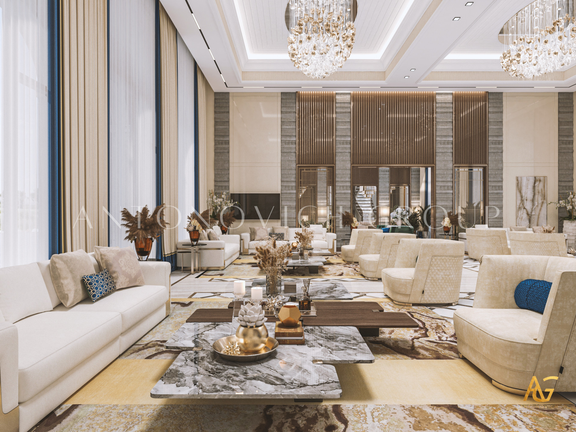 This picture shows a modern white kitchen designed by Antonovich Design. The kitchen features an island, countertops, and cabinets with a glossy finish, a hood over the stainless steel range, recessed lighting, and tile backsplash. There is also an adjoining dining area with a round table and chairs.