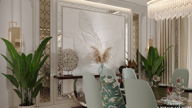 A luxurious dining room with a large marble table, crystal chandelier, and white velvet armchairs.