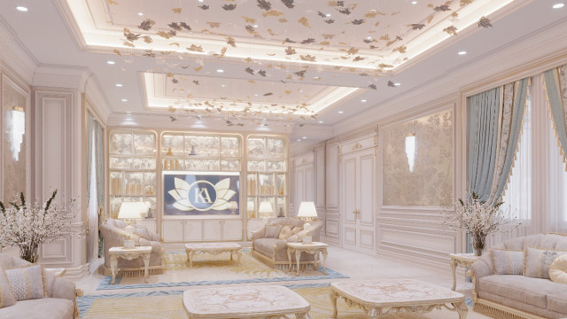 This picture shows the interior of an opulent, modern living space featuring a large, sun-filled room with tall ceilings and a contemporary design. The room has several luxurious furnishings, including a white leather chaise lounge, two plush sofas, and a grand piano. A marble fireplace surround, crystal chandeliers, and abstract artwork on the walls give the room extra character. Large windows provide views of the outdoors and natural light.