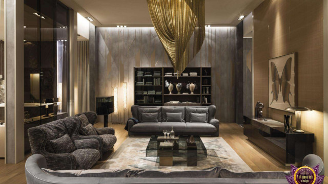 This picture shows a luxurious bathroom with a sleek modern design. The room has a unique circular bathtub in the center with a black and white marble countertop. There is also a walk-in shower with diamond-shaped tiles and a freestanding sink with a marble top. The walls are decorated with intricate wallpaper and large mirrors, and there is recessed lighting in the ceiling to add extra illumination.