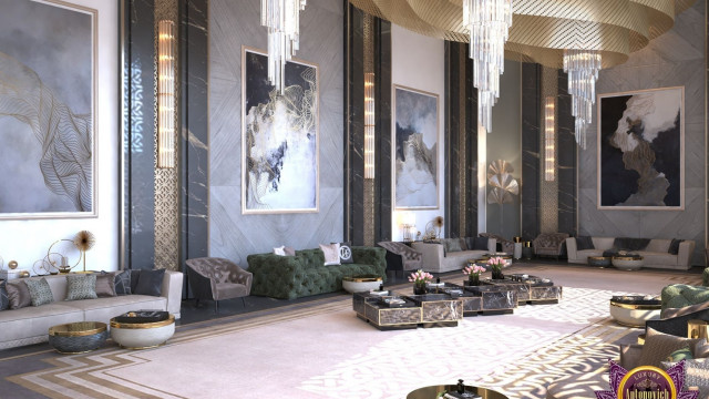 This picture shows a luxurious modern interior design. The room features a round black marble table with a contemporary silver chandelier hung above, flanked by two black leather armchairs. In the background there are floor-to-ceiling windows surrounded by deep grey walls, with a curved stone wall feature in one corner of the room. In addition, a white fur rug and black and white patterned cushions are visible in the foreground.