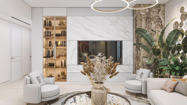 A modern interior design in a luxurious home featuring a bright open space with white marble floors, walls and ceiling fixtures, beige sofas and ottomans, and chandeliers.