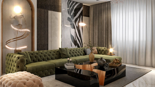 This picture shows a modern, luxury living room with high ceilings and beige walls. The space is decorated with a sleek black-and-white sofa, two modern armchairs, a round glass coffee table, and several red and gold accent pillows. On the walls, there are two large abstract artworks which help to add an even more modern touch to the space. The floor is covered in a luxurious white marble, and the two lamps help to add an elegant lighting to the room. Overall, this is a beautiful and classy living area.