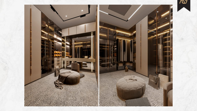 Luxurious interior room featuring grand ceiling with complex, ornate design. Rich wood flooring complemented by a white and beige themed furniture and accents.