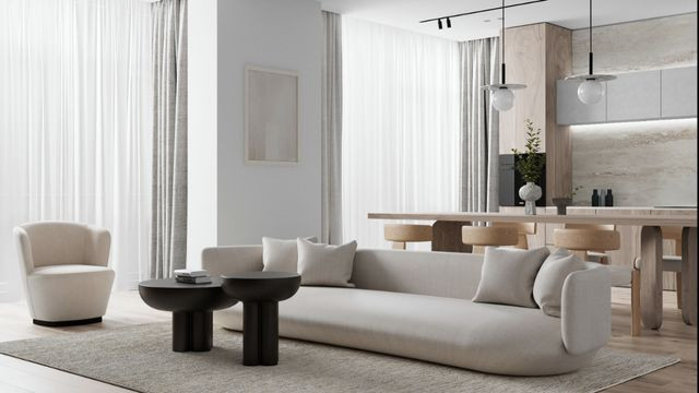 Modern luxury hallway featuring a white marble floor, grand crystal chandelier and gold-accented walls.