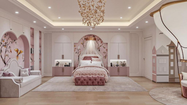 The picture shows a luxurious master bedroom featuring a velvet headboard, crystal chandelier and opulent bedding.