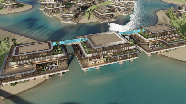 Antonovich Design's luxury villa complex on Dubai Island, showcasing Interior Design Dubai. Aerial view of modern waterfront residences with interconnected pools and landscaping.